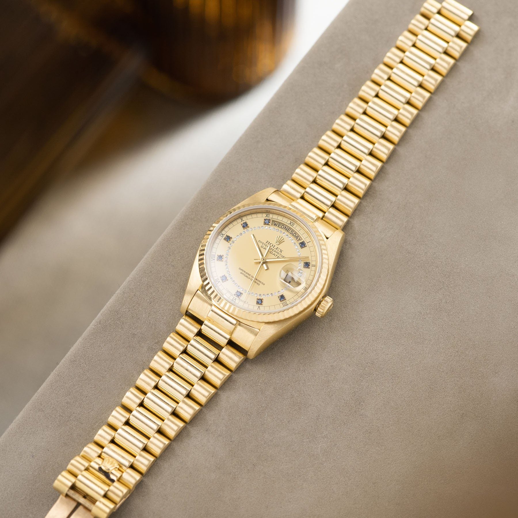 Rolex Day-Date Reference 18038 Blue Sapphire String Dial on a yellow gold President bracelet