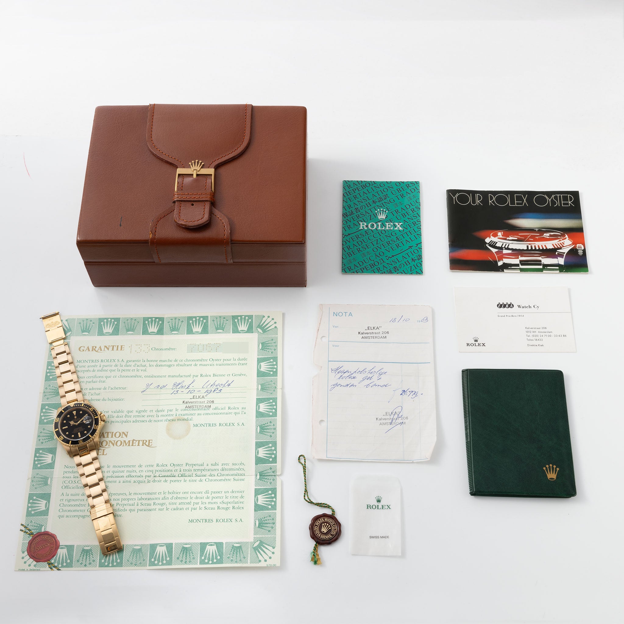 Rolex Submariner Date in 18k gold ref. 16808 with black nipple dial Box and Papers