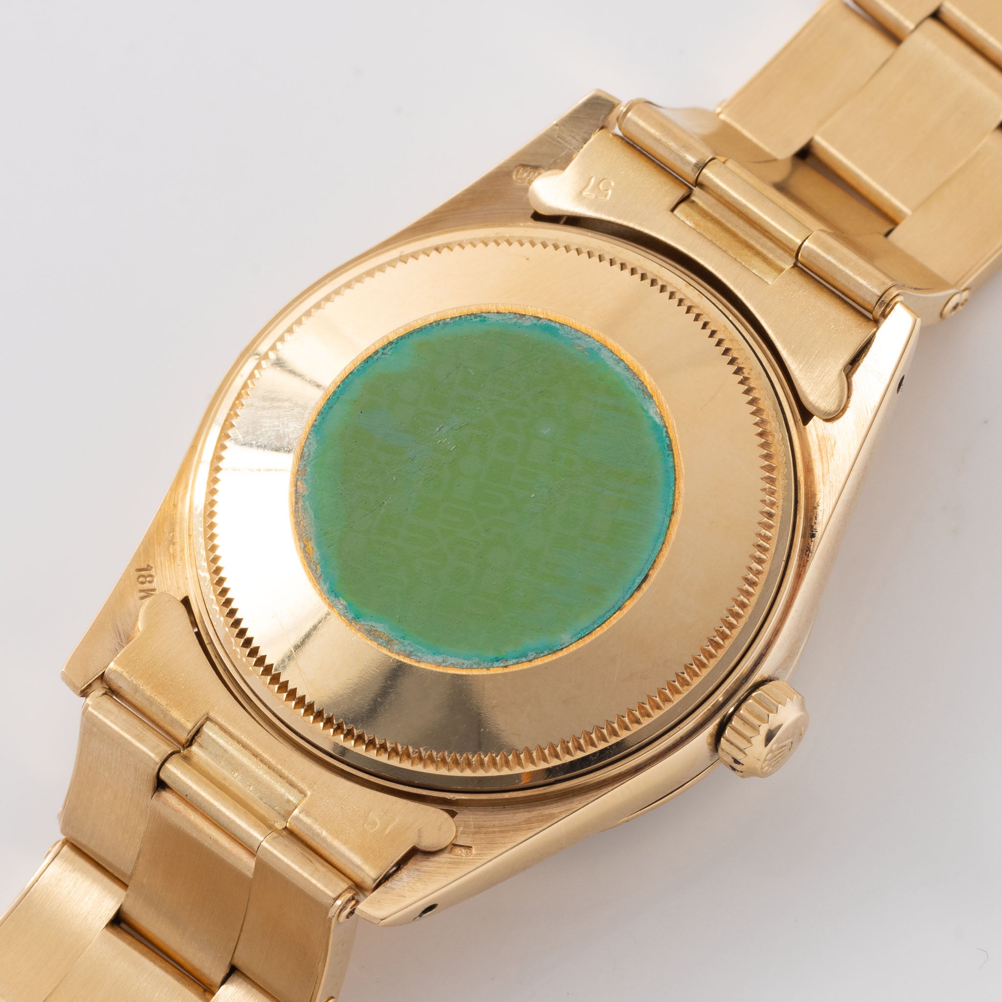 Rolex Oyster-perpetual date black dial in 18 k yellow gold ref 15038