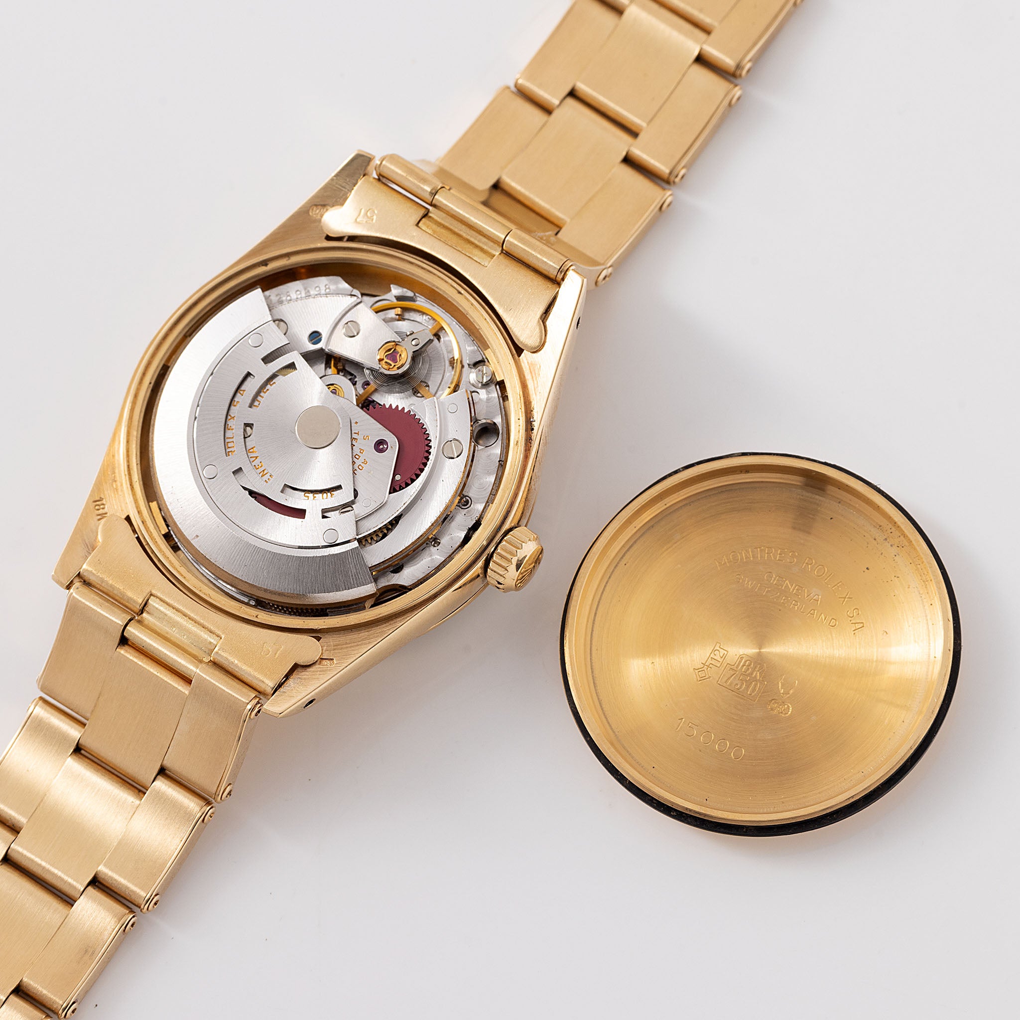 Rolex Oyster-perpetual date black dial in 18 k yellow gold ref 15038
