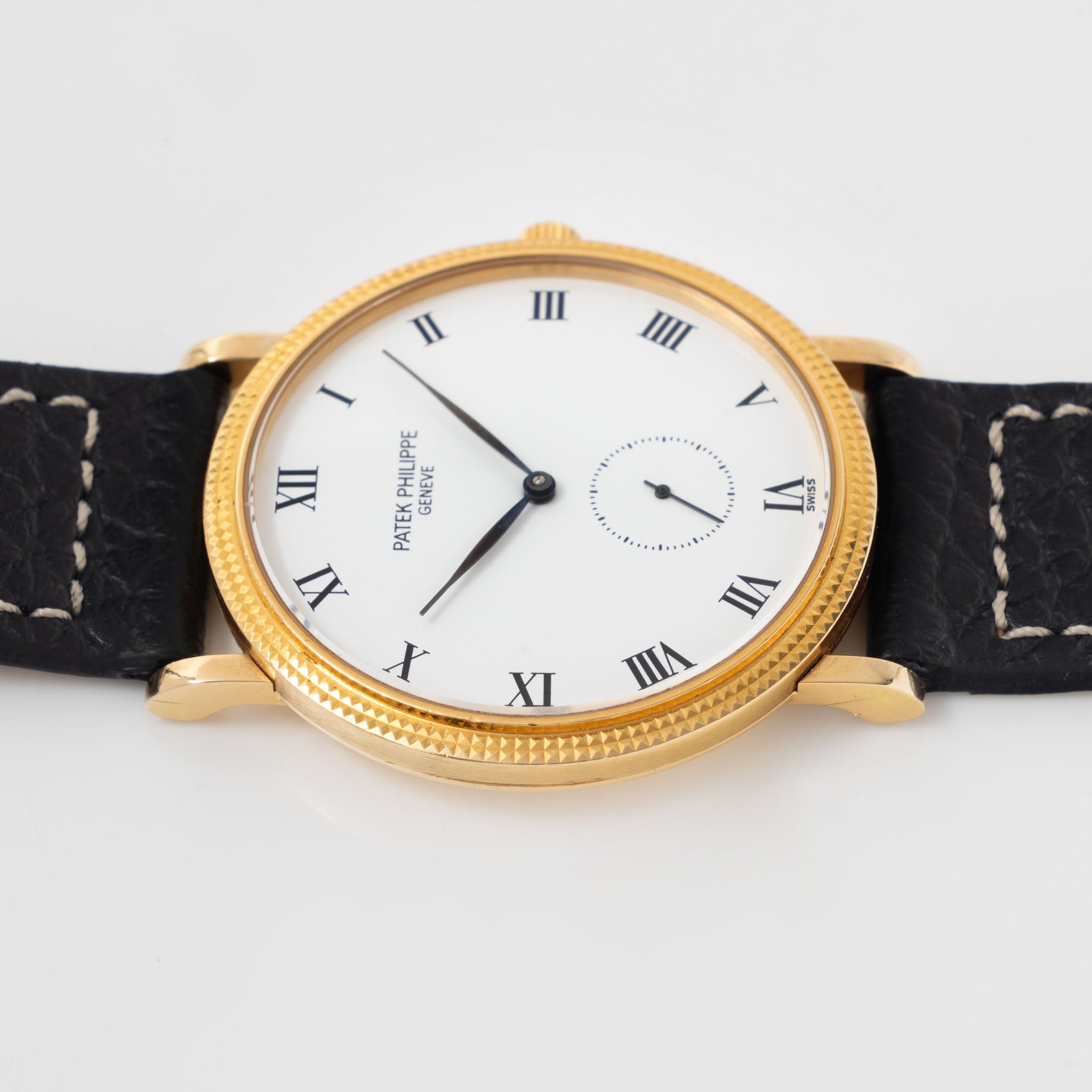 Patek Calatrava Porcelain dial , Clous de Paris 18k yellow gold case with extract from the archives ref 3919
