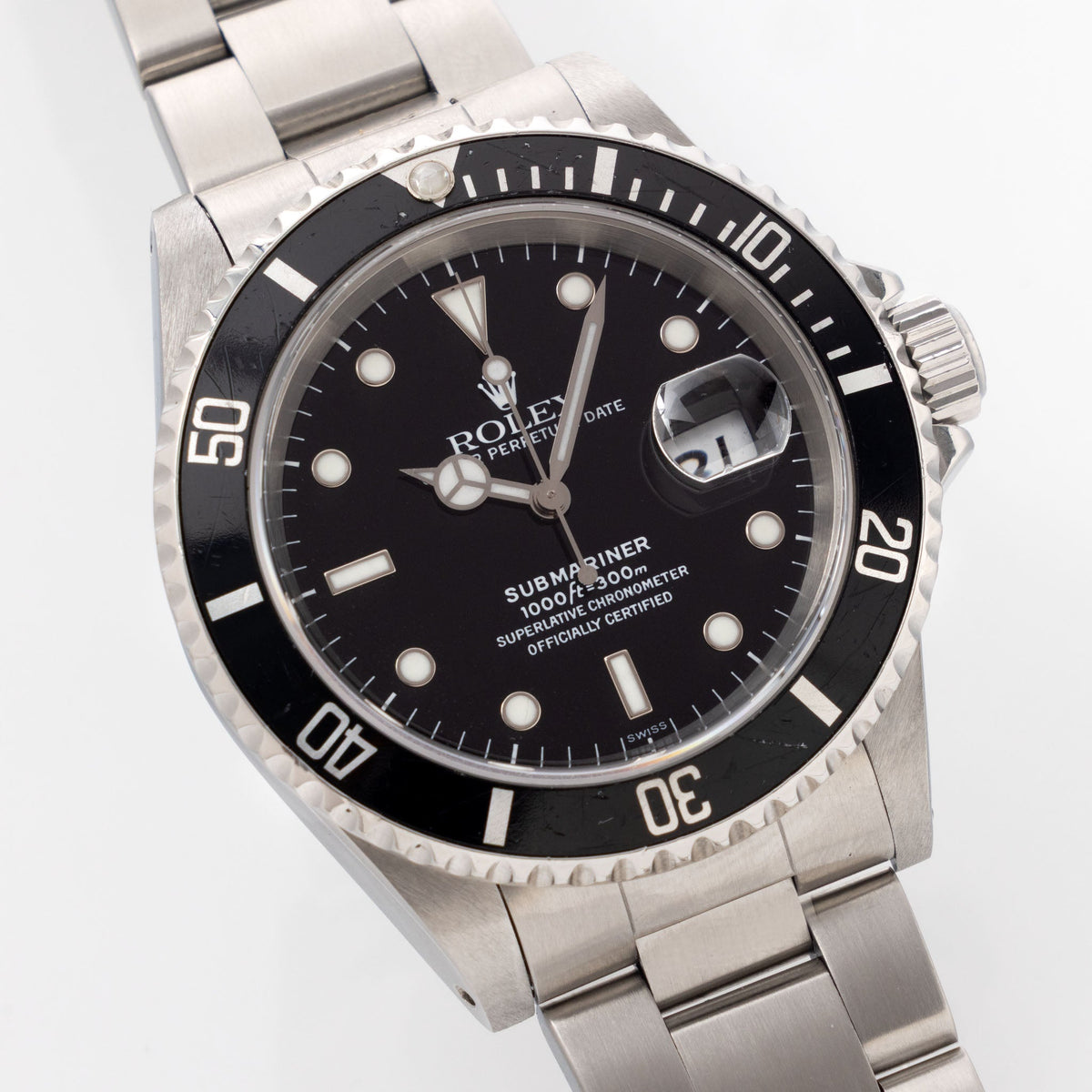 Rolex Submariner Date 16610 Swiss Only Dial with Original Guarantee Paper