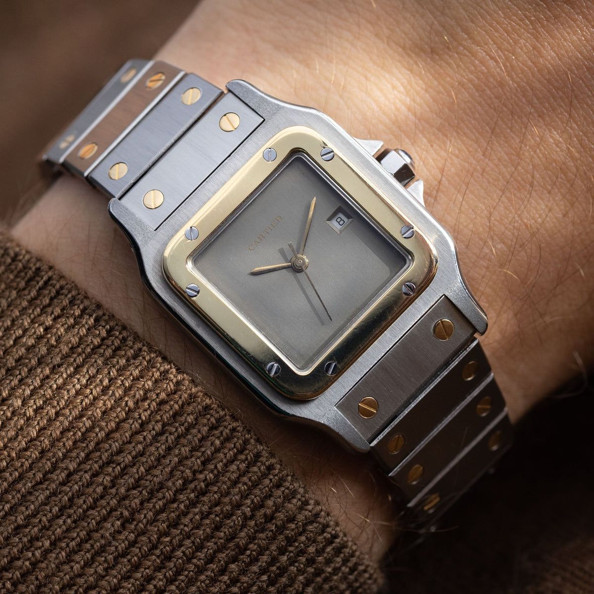 Steel-and-gold Santos 2961 with the plain slate-grey dial, only logo and date, the 'Ghost' configuration. · Photo: Bulang & Sons · © Bulang & Sons, used with permission · Source: https://bulangandsons.com/products/cartier-santos-2961-steel-and-gold-with-slate-grey-dial-w1923