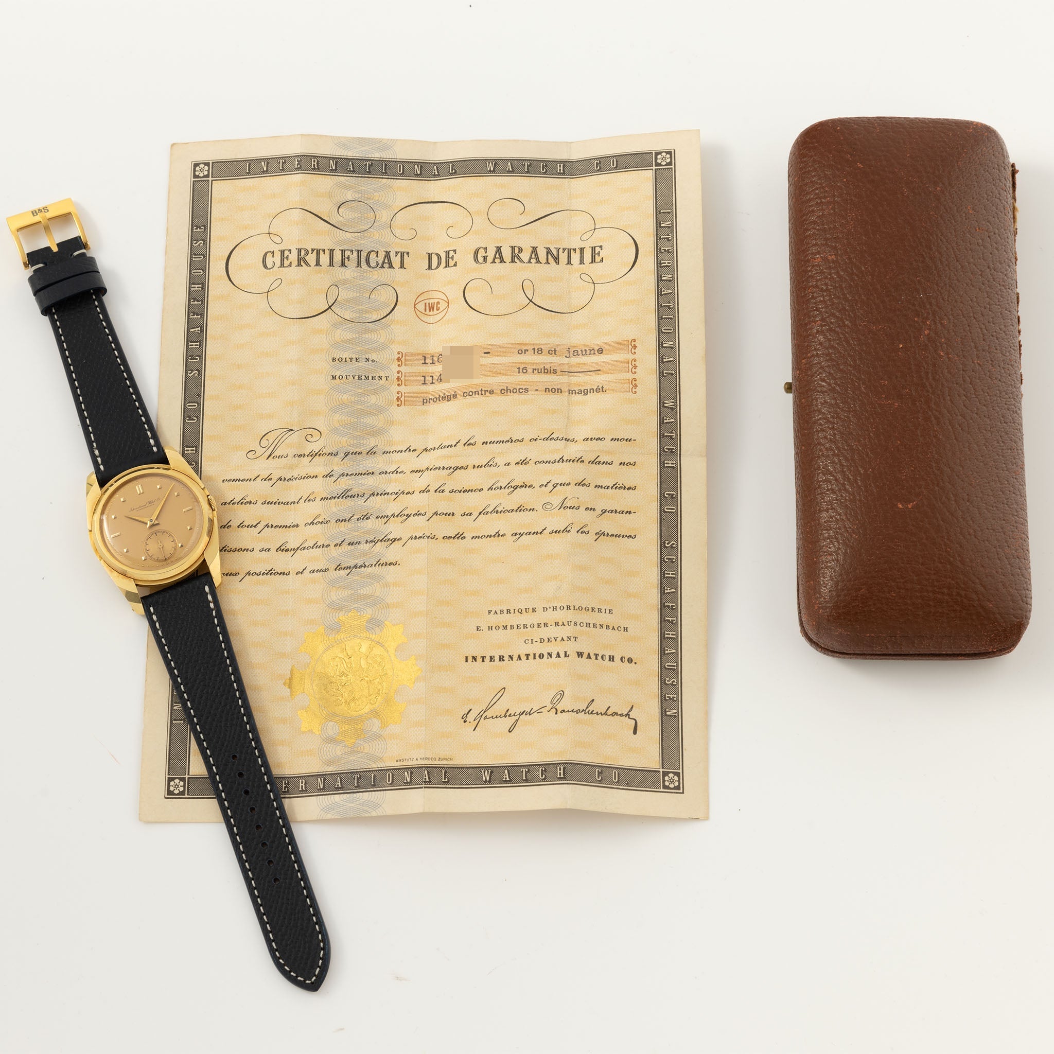 IWC Dresswatch in 18 k yellow gold "UFO " case with box and original guarantee paper