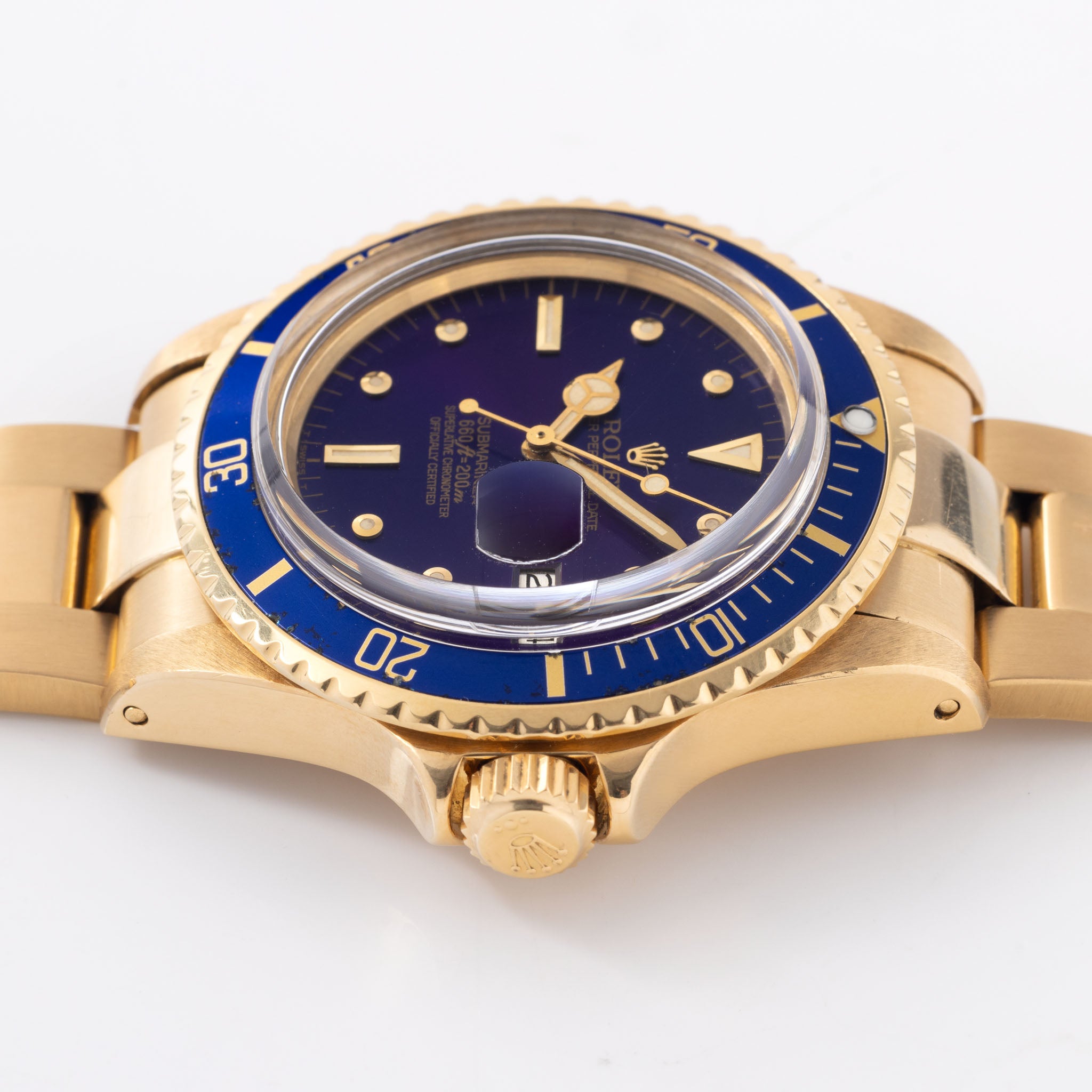 Rolex Submariner 1680/8 in 18k Yellow Gold with Blue "Nipple" Dial Turned Purple