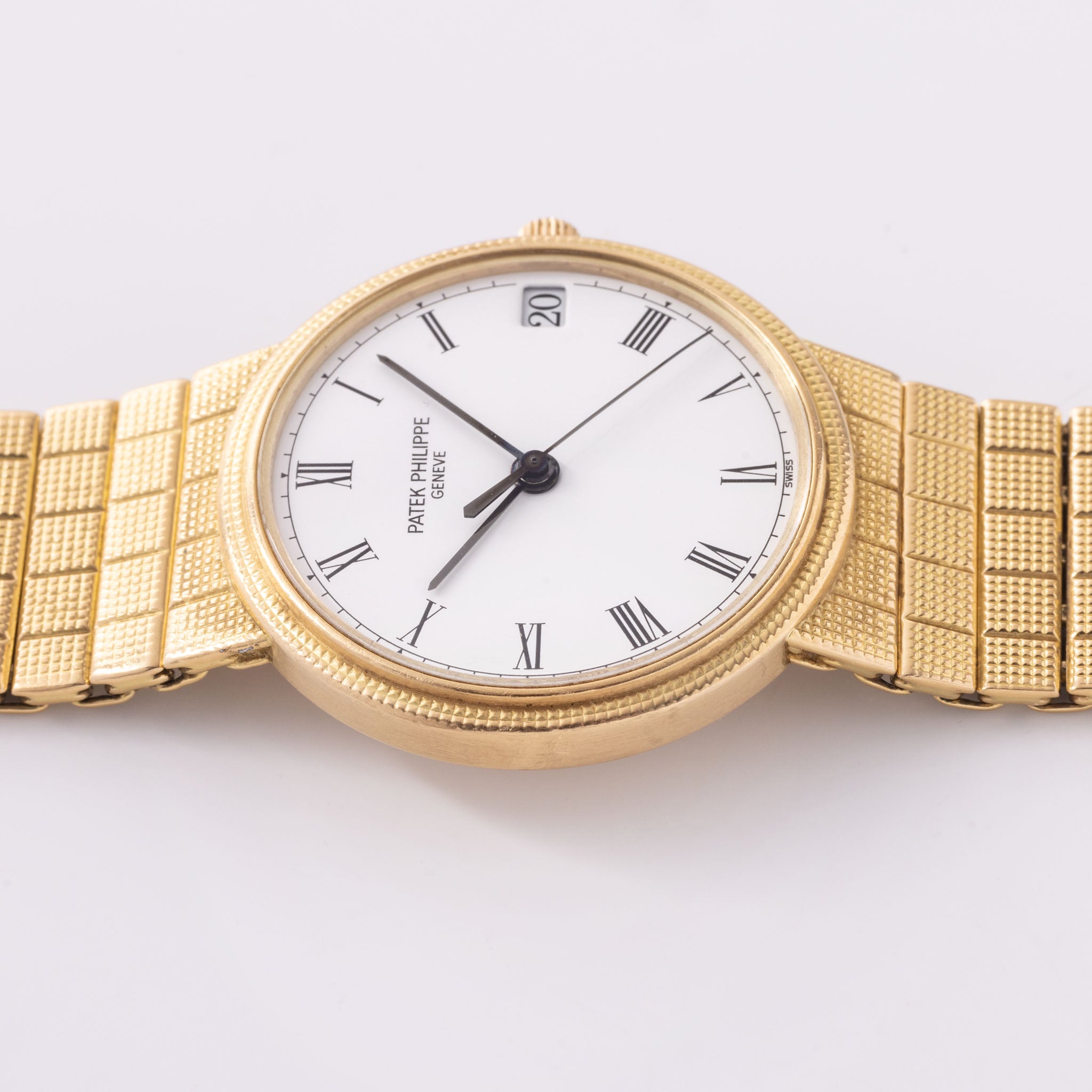 Patek Philippe Calatrava Automatic White Dial in 18k Yellow Gold Ref. 3802J with Integrated Bracelet