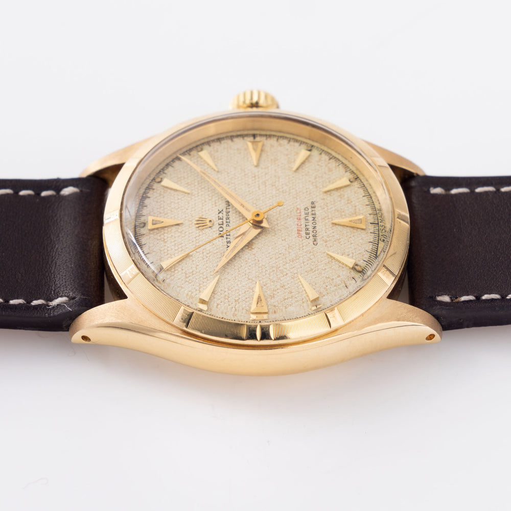 Rolex Oyster-Perpetual 6285 with Honeycomb Red Writing Dial in 18K Yel