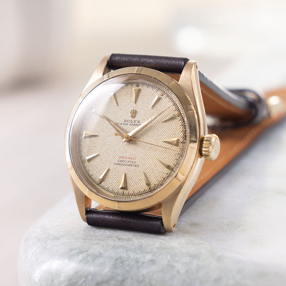 Rolex Oyster-Perpetual 6285 with Honeycomb Red Writing Dial in 18K Yel