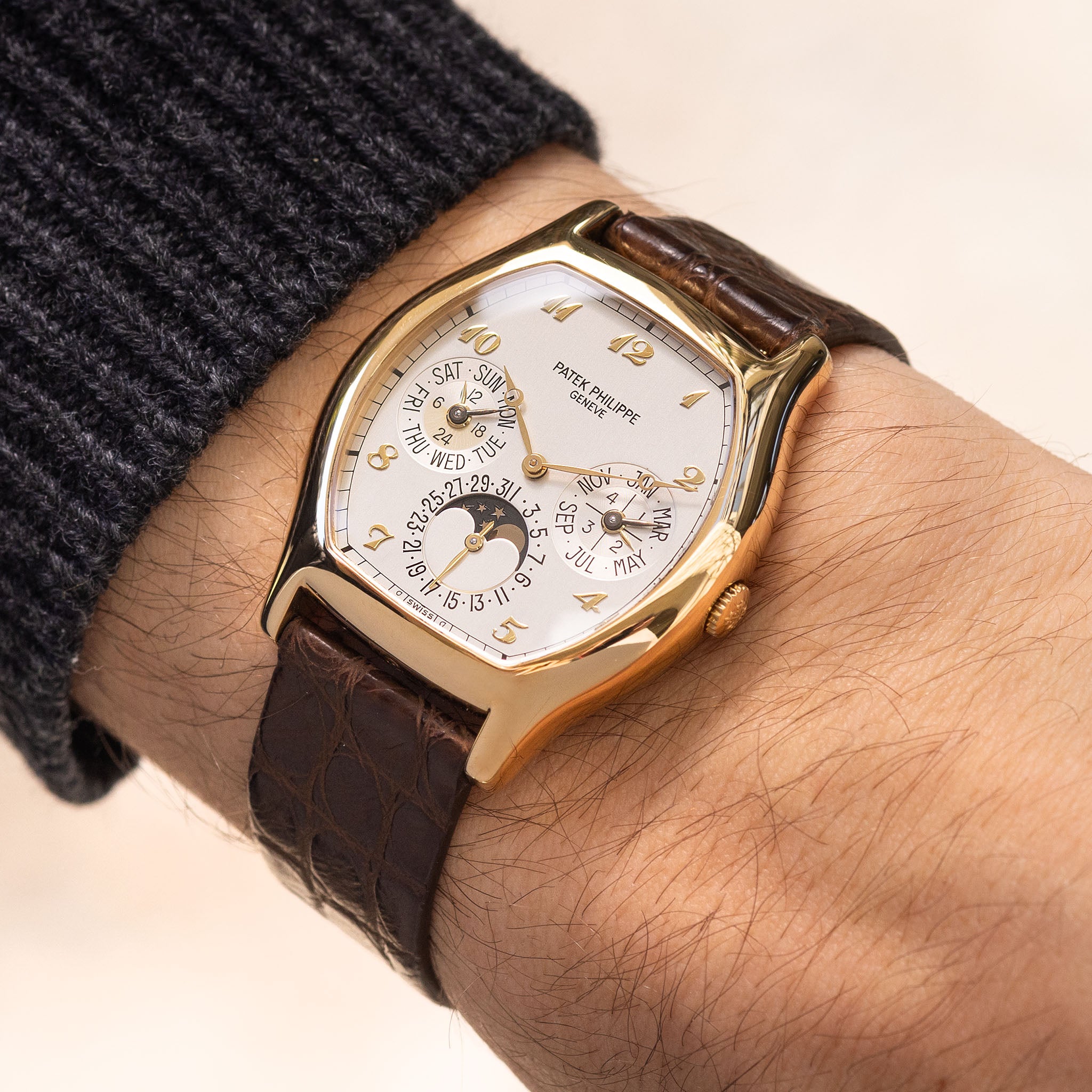 Patek Philippe Perpetual Calendar 5040J in 18k yellow gold Tonneau case with box and papers
