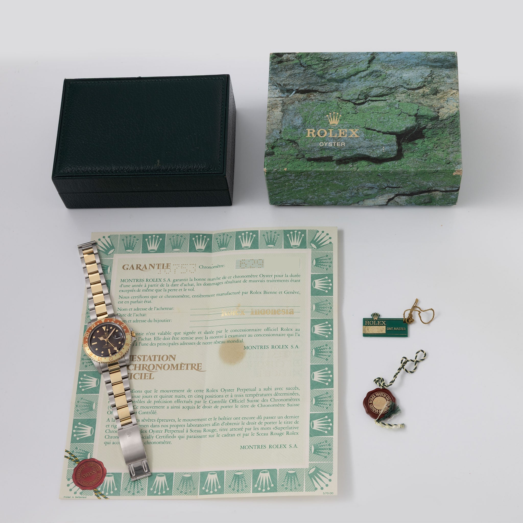 Rolex Gmt-master steel and gold Brown nipple  dial box and punched  paper set ref 16753 