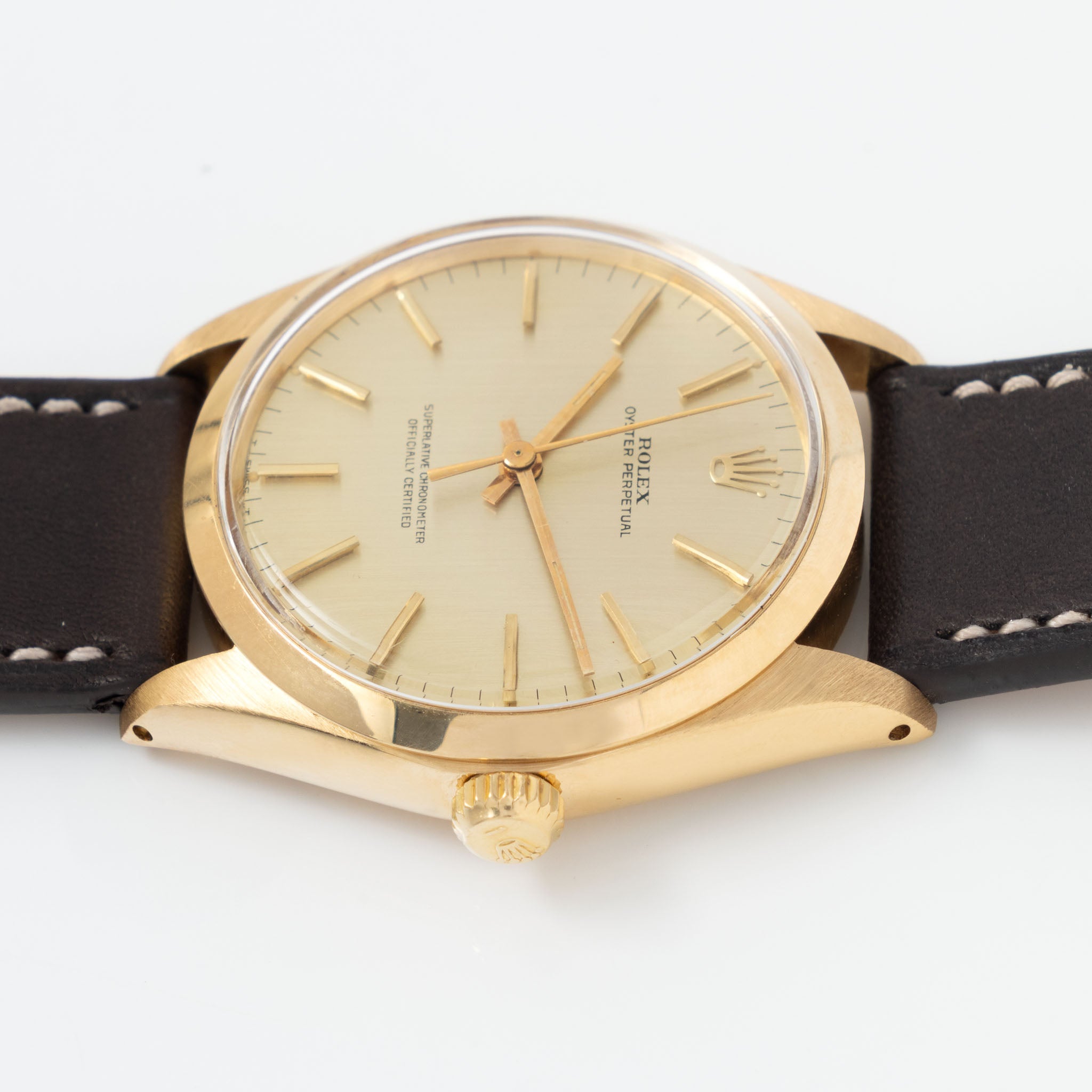 Rolex Oyster Perpetual 1002 Vertical Brush Champagne Dial in 18k Yello