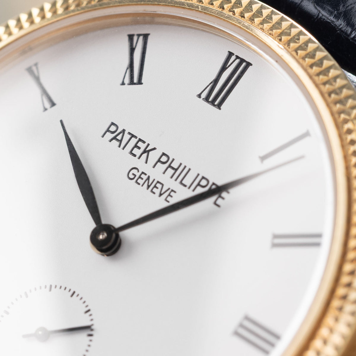 Patek Philippe Calatrava Ref 7119J 18k Yellow Gold Clous de Paris with White Roman Dial
