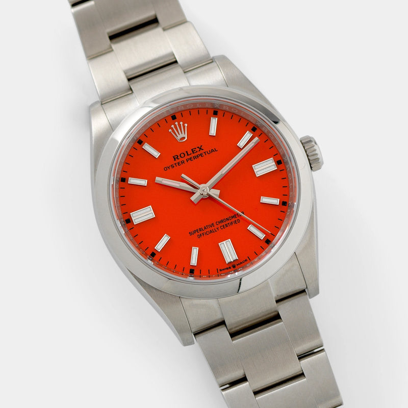 Rolex Oyster Perpetual Ref 126000 Coral Red Stella Dial