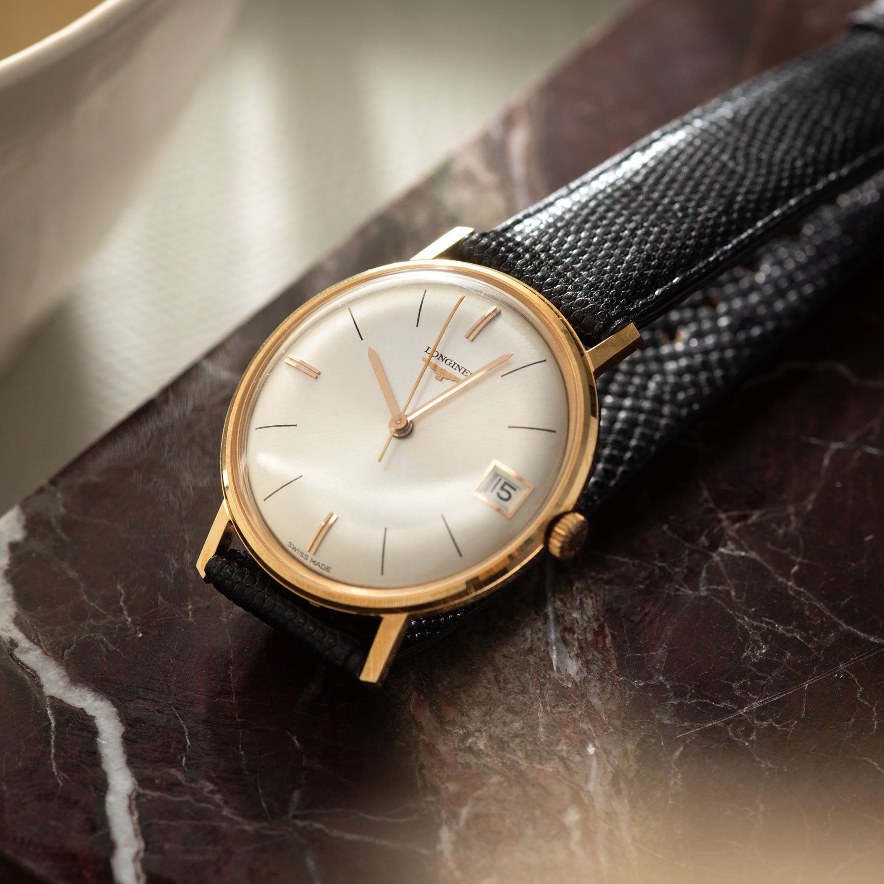 Old longines watches prices best sale