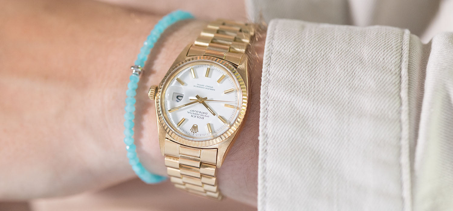 Rolex president store on wrist