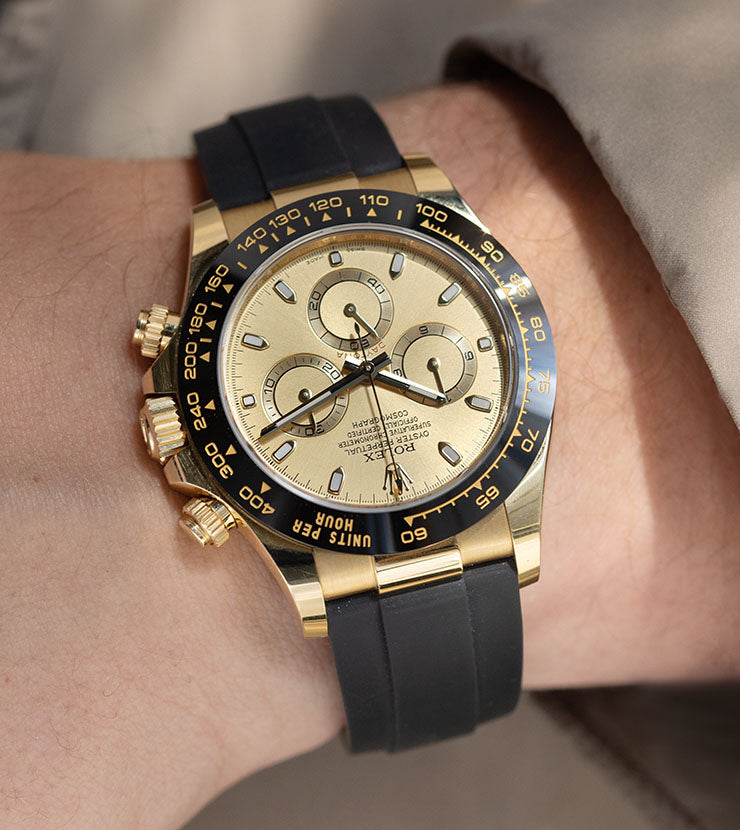 Rolex daytona gold bezel sale