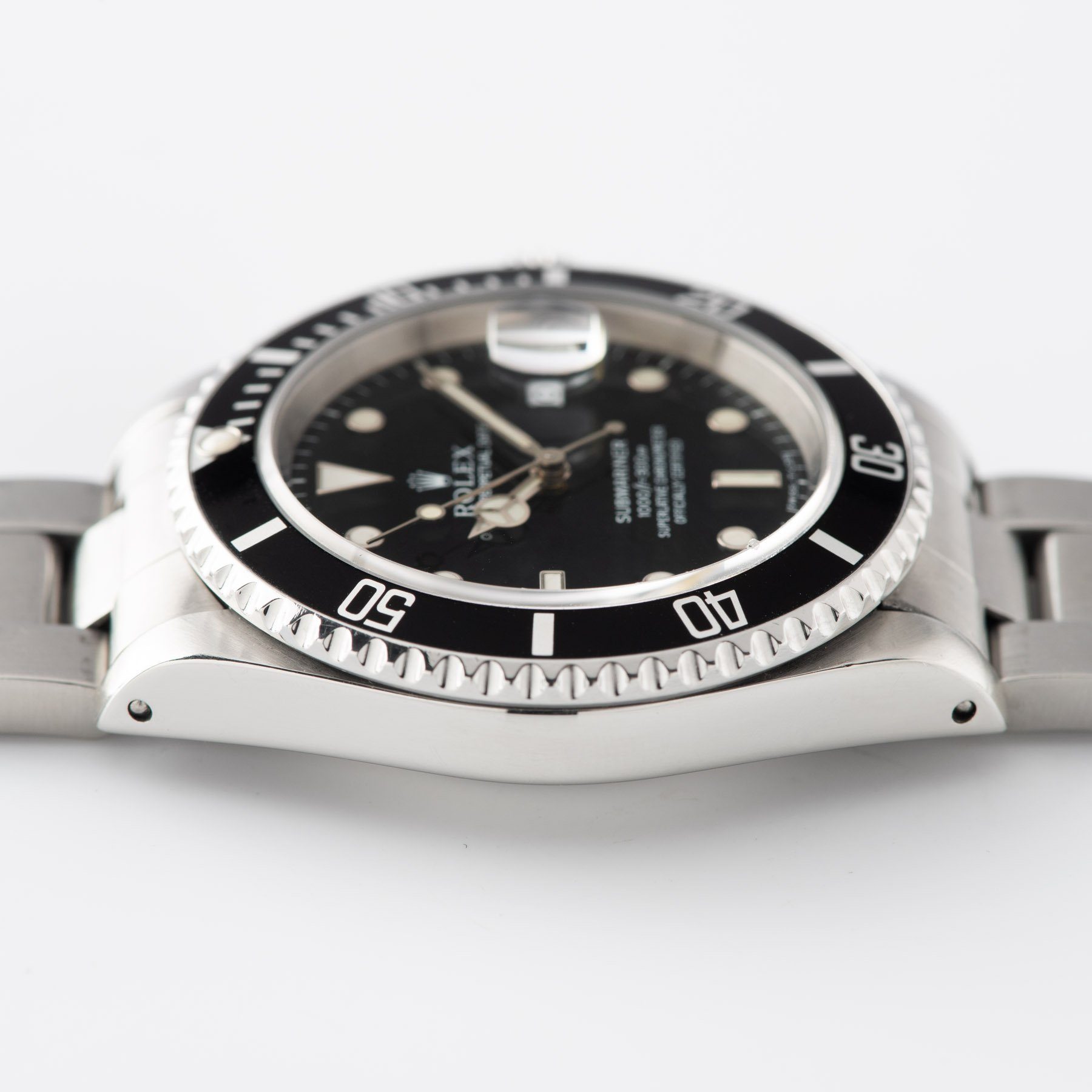 Rolex Submariner Date Reference 16610 with Papers and modern sapphire glass